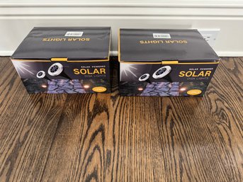 Two Boxes Brand New Solar Disc Lights