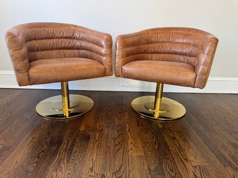 Pair Of CB2 Leather Swivel Chairs