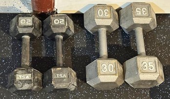 Set Of 4 Iron Dumbbells - Pair Of 20, Single 30, Single 35