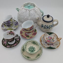 Collection Of Teacups And Saucers With Teapot.