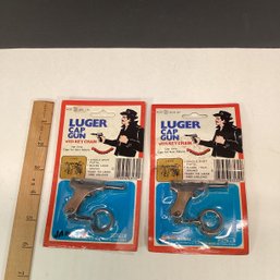2 1970s Dime Store Toy Gun Keychains, New In Package