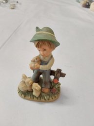 Napco Boy With Rabbits Figurine