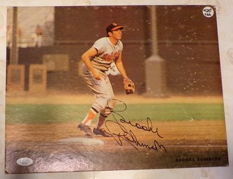 Autographed 11x14 Photo Board Of Hall Of Fame Third Baseman Brooks Robinson, Baltimore Orioles, (JSA GG64904)