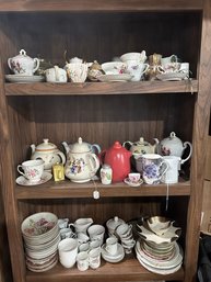 Three Shelves Full Of Tea Cups, Teapots, Saucers, Dessert Dishes, Pitchers And More See All Photos