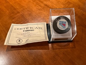 Brian Leetch Autographed New York Rangers Hockey Puck In Case With COA
