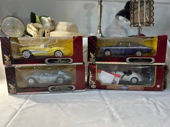 Lot Of Four Diecast Metal Cars In Damaged Boxes Please See Photos