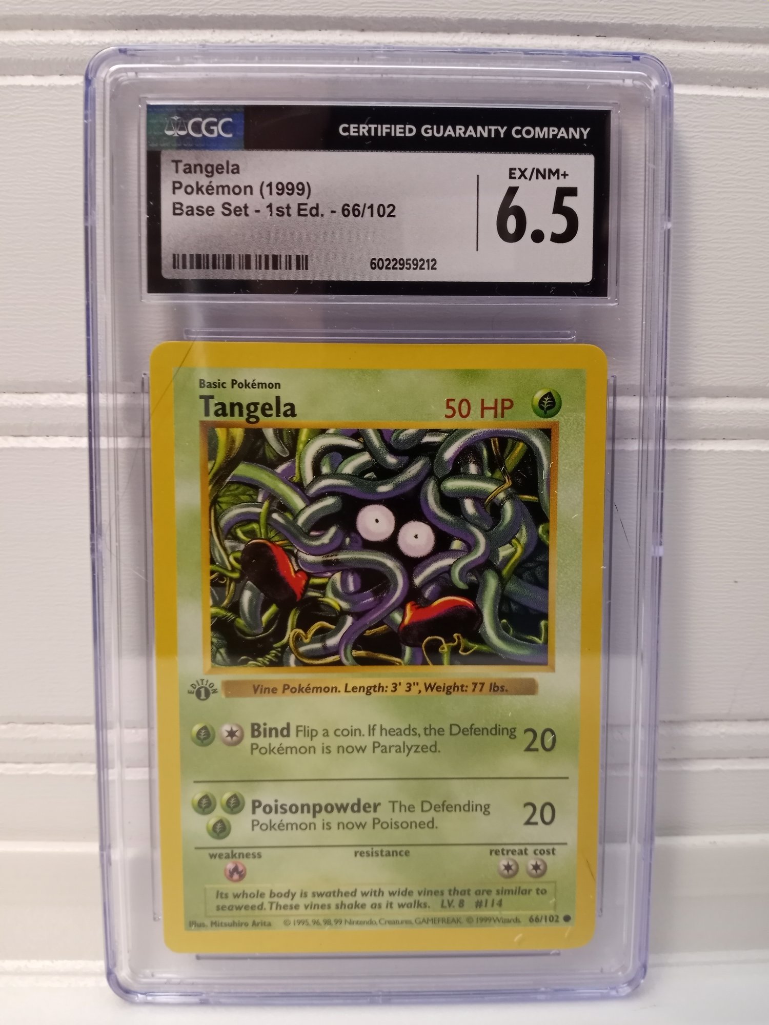 1999 Pokmon Tangela 1st Edition Base Set CGC 6.5 EX/NM Graded Card 66/102  #7222 | Auctionninja.com