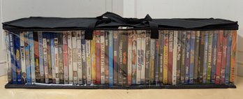 About 50 Comedy DVDs In Carrying Case Featuring Adam Sandler, Shrek 2, Juno & More