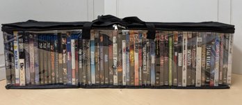 About 50 Sci-Fi And Action DVDs In Carrying Case Featuring LOTR, Terminator, More