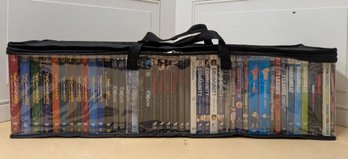 TV Show DVD Collection In Case With Two And A Half Men, Community, Grimm, Justified