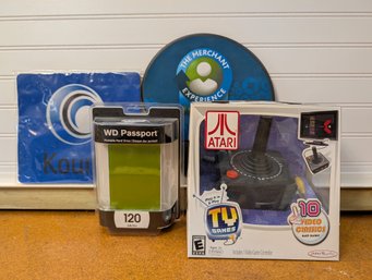 Mixed Lot WD Passport Drive, Atari TV Game, Puzzled Mouse Pads, Chase Pad