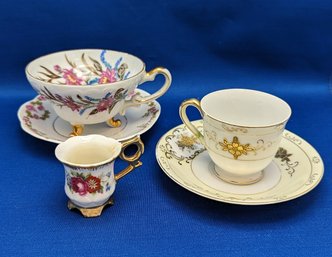 Ornate Teacup And Plate Set