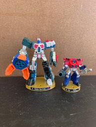 Hasbro Transformers Attacktix Action Figures From 2006, Specifically Omega Sentinel And Super Optimus Prime