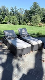 Pair Of Woven Resin Reclining Outdoor Chaise Loungers With Side Lever