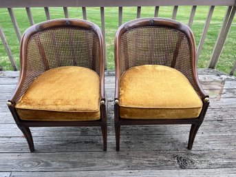 Regency-style Cane Chairs Feature A Mahogany Frame, Woven Cane Backrest, And A Velvet Seat Cushion