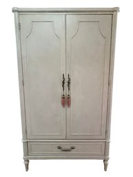A  French Provincial Style Armoire