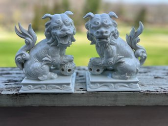 Pair Of Chinese-style White Porcelain Foo Dog Figurines