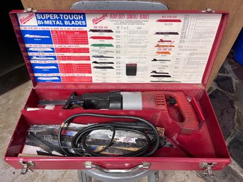 Milwaukee Sawzall Corded Reciprocating Saw Housed In Its Original Red Steel Carrying Case.