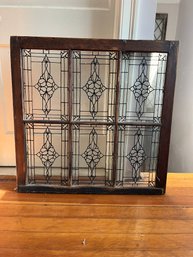 Clear Beveled And Textured Glass Window Panel In A Wooden Frame