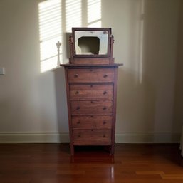 Antique Oak Highboy Dresser With An Attached Mirror
