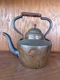 Copper Tea Kettle With A Wooden Handle