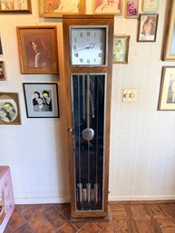 Ridgeway Grandfather Clock, Specifically A Mid-Century Modern Model With An Oak Case And Polished Chrome Accen