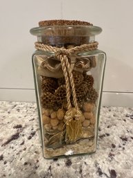 Apothecary Glass Jar Filled With Decorative Potpourri Sealed With A Cork Topper