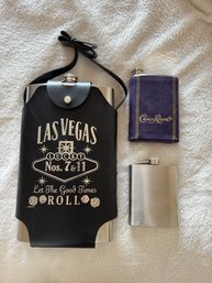 A Collection Of Flasks Large And Small