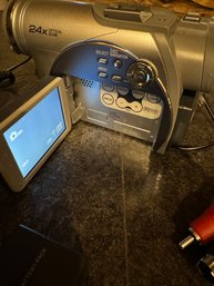 Panasonic Video Camera With Battery(2), Battery Charger, And Light