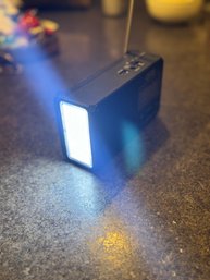 QFX AM/FM Radio, Bluetooth LED Flashlight Solar Radio
