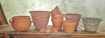 Group Of Terra Cotta And Concrete Planters Seen Here
