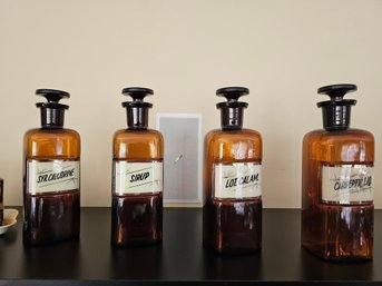 Cool Set Of Four Pharmaceutical Bottles
