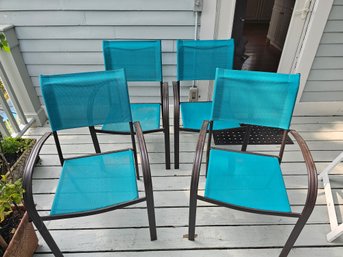 Group Of Four Stackable Patio Chairs