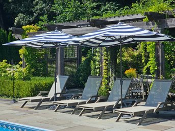 Pair Of Navy And White Patio Umbrellas With Stands