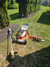 Group Of Stihl Battery Powered Garden Tools (mower, Trimmer And Chainsaw)