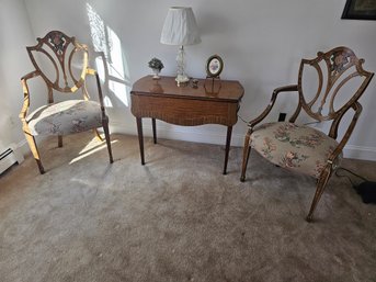 Painted Table And Highly Decorated Arm Chair Seating Arrangement