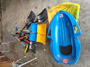 All The Snow Shovels And Sleds Seen Here