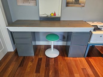 Pair Of File Cabinets And Cross Piece Forming A Desk