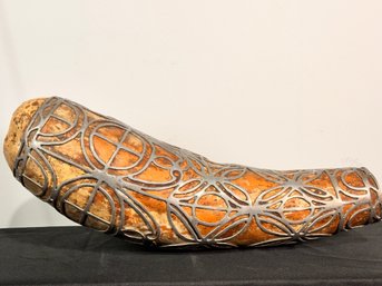 Decorative Metal Work Wrapping Around A Gord