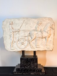 Bas Relief Depicting A Chariot Scene