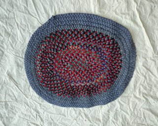 Oval Braided Rug ~35 1/2' X ~31 1/2'.
