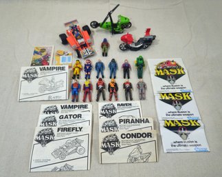 Assorted Vintage Kenner M.A.S.K. Actions Figures, Vehicles, &  Manuals Group