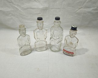 Assorted Vintage Figural Lincoln & Moses Bottles Group