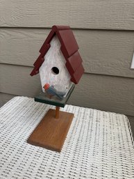 Rustic Wooden Birdhouse On Pedestal Stand With Decorative Bird