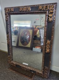 Ornate Dark Finished Rectangular Mirror With Intricate Carvings And Gilded Gold Finish