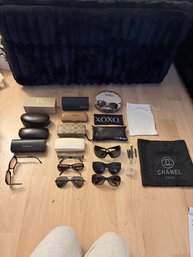 Name Brand Sunglass Cases And Some Glasses