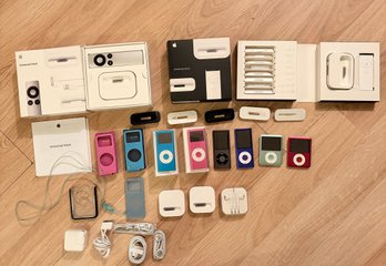 Collection Of Apple IPods And Accessories