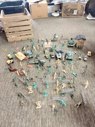 Collection Of Toy Soldiers And Military Vehicles