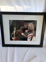 Framed Autographed Photograph Of Evander Holyfield And Riddick Bowe