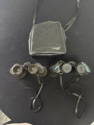 Two Pairs Of Tasco Binoculars And Carrying Case
